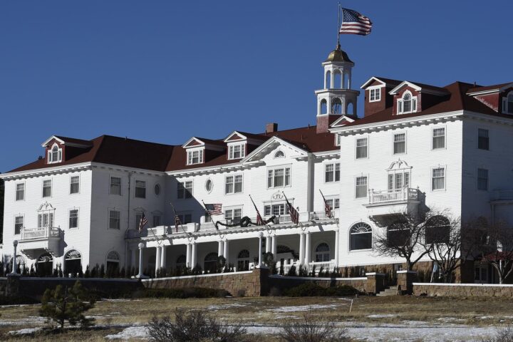 ESTES PARK, CO - JANUARY 12: The beautiful Stanley Hotel on January 12, 2016 in Estes Park, Colorado. The hotel is located 10.4 miles from the Rocky Mountain National Park. The grand, upscale hotel dates back to 1909. The Stanley Hotel, known for its architecture, magnificent setting, and famous visitors, may possibly be best known today for its inspirational role in the Stephen King's novel, "The Shining." This Colorado hotel has been featured as one of America's most haunted hotels and with the numerous stories from visitors and staff. (Photo by Helen H. Richardson/The Denver Post via Getty Images)